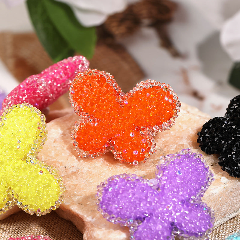Colored butterfly soft sugar beads filled with diamond acrylic beads